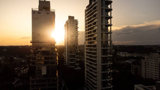 istock Sunset at city skyscrapers 1448148850