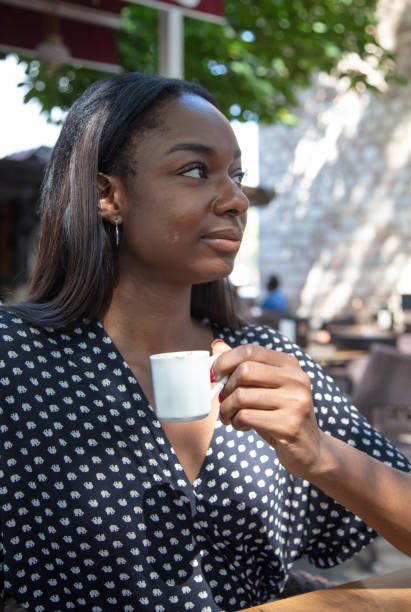 istock Black woman is drinking Turkish coffee. 1448153954
