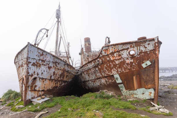 istock Old, rusty whaling ships and processing facilities at a now abandoned whaling station in Grytviken -on the island of South Georgia. 1448154810