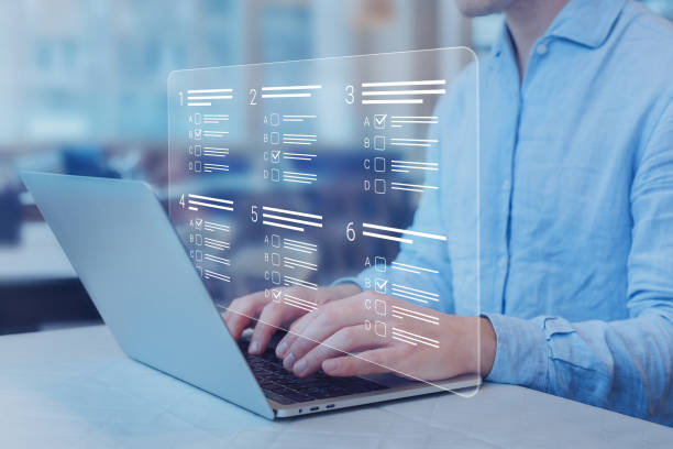 istock Person passing online test, assessment or academic exam and answering multiple choice questions on computer screen. E-learning, remote student, survey, questionnaire, quiz on internet. MCQ. 1448155330