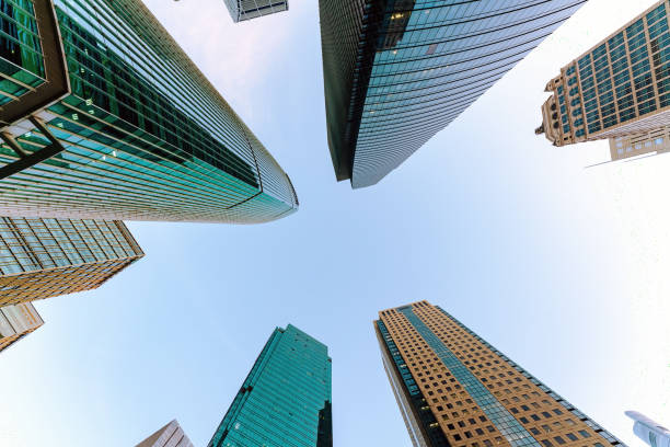 istock Low angle shot of modern office buildings and sky 1448156251