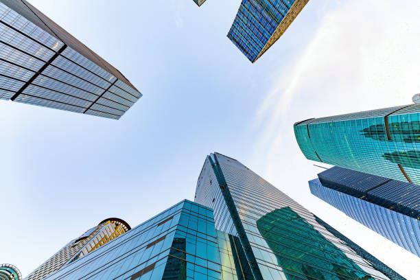 istock Low angle shot of modern office buildings and sky 1448156264