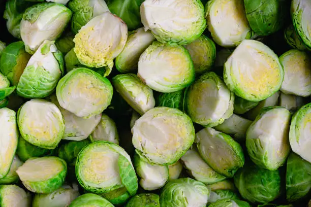 Close up of uncooked Brussels sprouts that have been cut in half