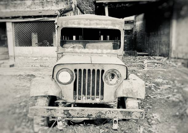 istock Traditional abandoned vehicle around a garage 1448158287