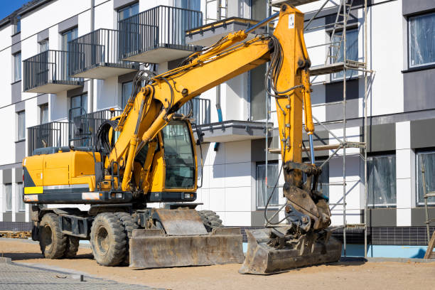 Construction machinery at the construction site of a housing estate stock photo