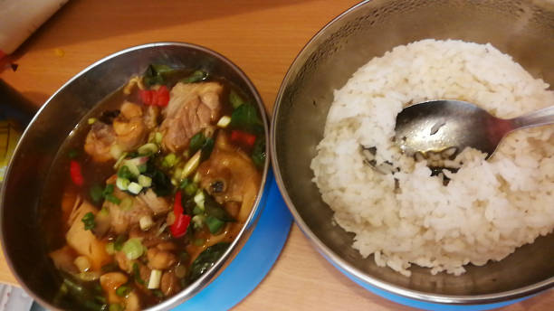 istock healthy spicy chicken and white rice 1448159254