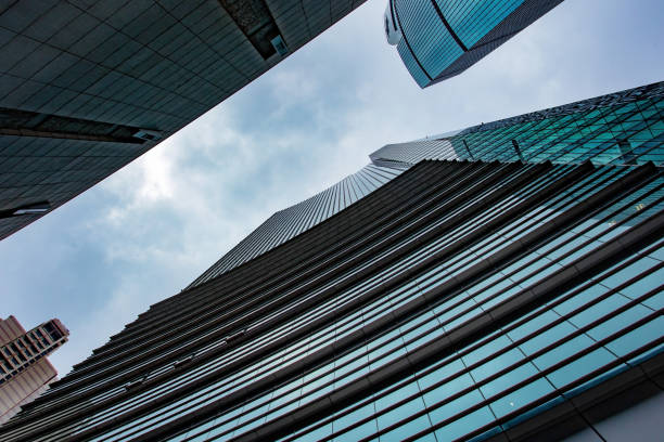 istock Low angle shot of modern office buildings and sky 1448159919