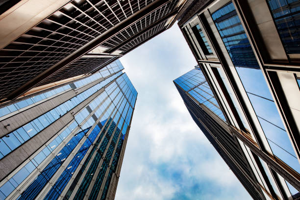 istock Low angle shot of modern office buildings and sky 1448159945