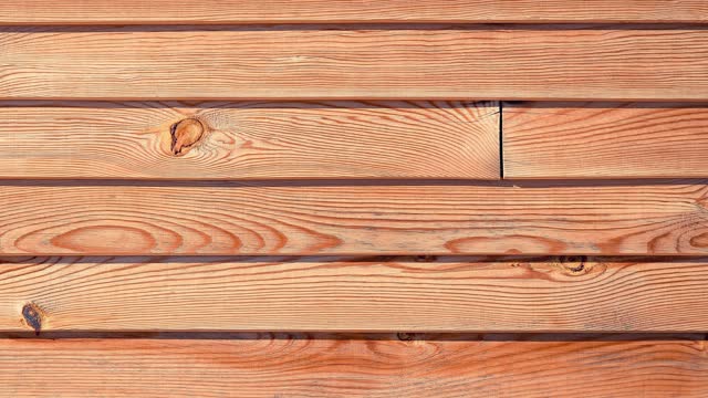 Wooden background seamless loop. Horizontal planks texture. Horizontal along direction.