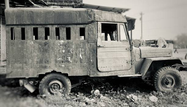 istock Traditional abandoned vehicle around a garage 1448165172