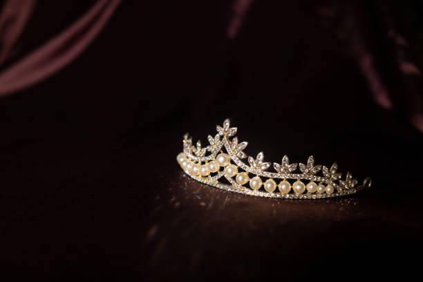 istock Luxury vintage peral diadem on dark red satin, silk background 1448166244