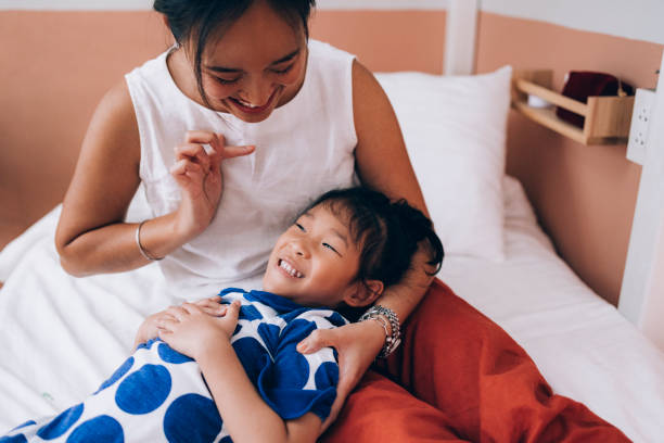 istock Asian Mother And A Daughter Playing Together 1448167921