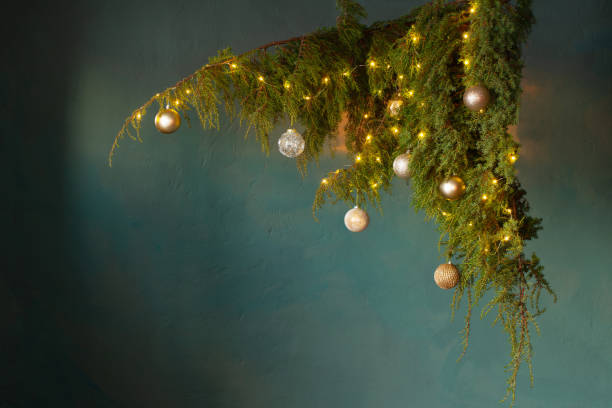 istock christmas decor with golden balls on background  dark wall 1448170227