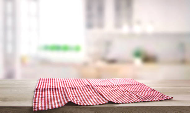 istock Checkered towel on wooden table. Food design layout. T 1448174340