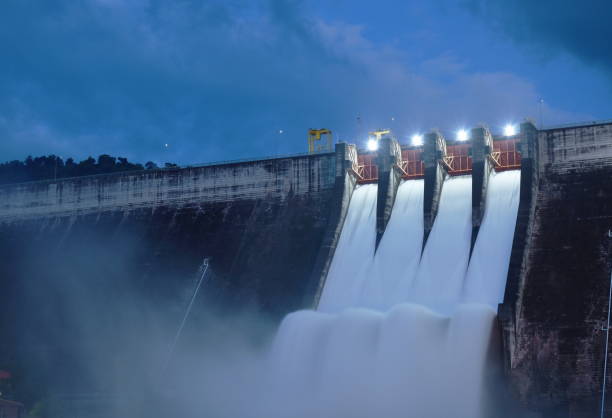 istock water splashing from floodgate Khun Dan Prakarn Chon huge concrete dam on night 1448174371