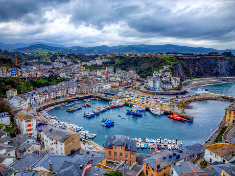 Touristic destination Luarca, Asturias, Spain, Europe. Nature urban landscape with fishing and pleasure port with boats.