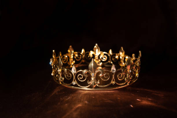 istock Vintage luxury sparkle rich golden crown 1448182374