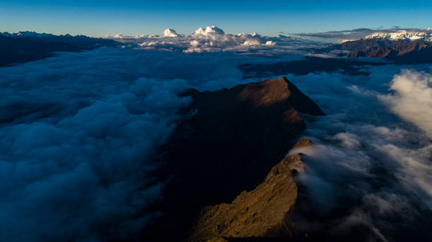 istock Clouds climb over the Himalayas, Tibet, China. 1448183865