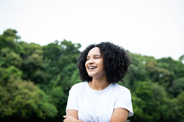 istock A beautiful young woman smiling 1448184936