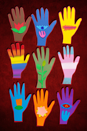 Illustrated poster with creative hands of different colors on red background