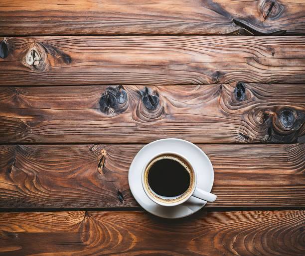 istock cup of coffee on wooden table 1448187902