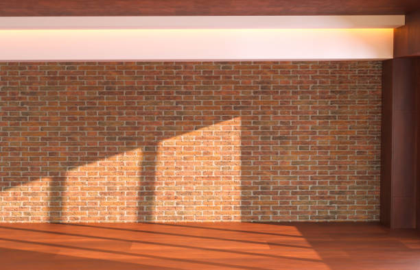 istock Spacious empty interior of brick wall and wooden floor with copy space. 1448189554