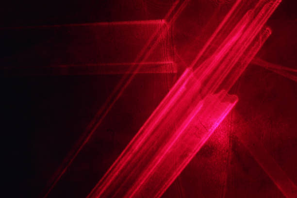 istock Backgrounds image of ray trajectory in a black background. 1448195141