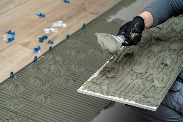 istock Laying tiles in the bathroom or kitchen 1448198030