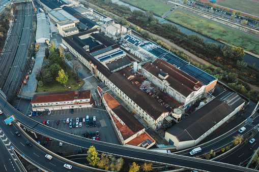Aerial view of warehouse storages or industrial factory or logistics center from above