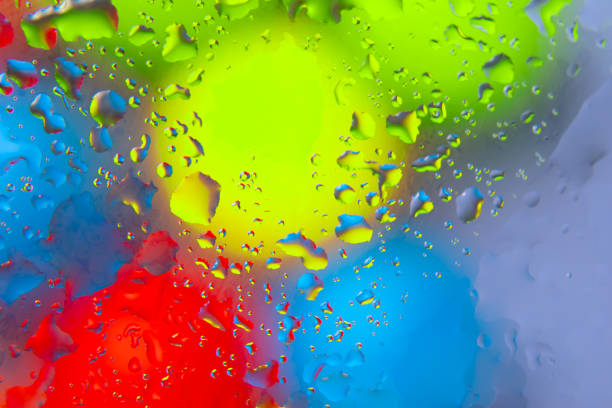 istock abstract colored balls of oily liquid on a blurred background. abstract background texture 1448201807