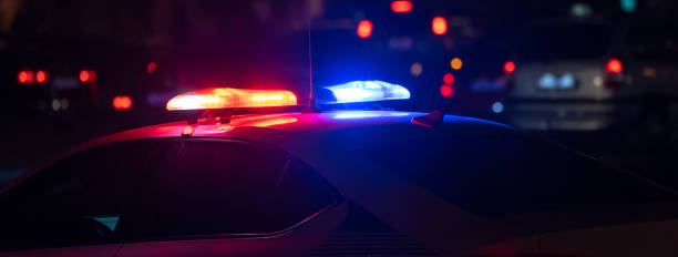 istock Police car with flashing lights on 1448212733