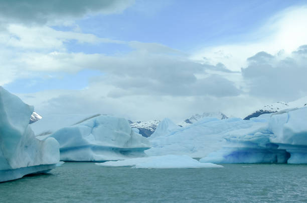 Large blocks of blue ice float on the waters of Lake Argentino after having separated from the Upsala glacier, El Calafate