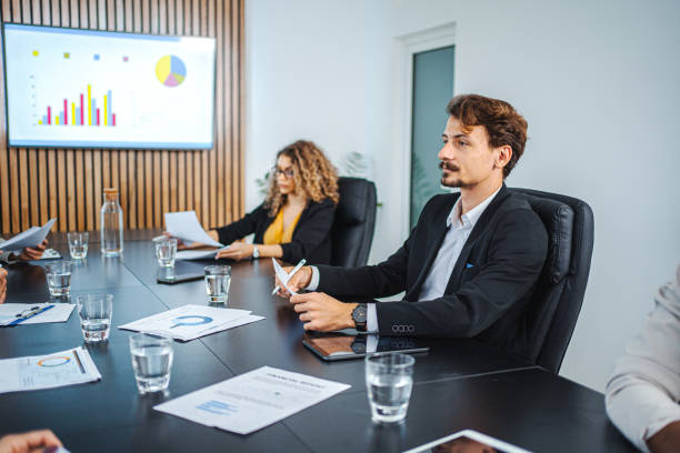 istock Business colleagues exchanging ideas on a corporate meeting 1448217028
