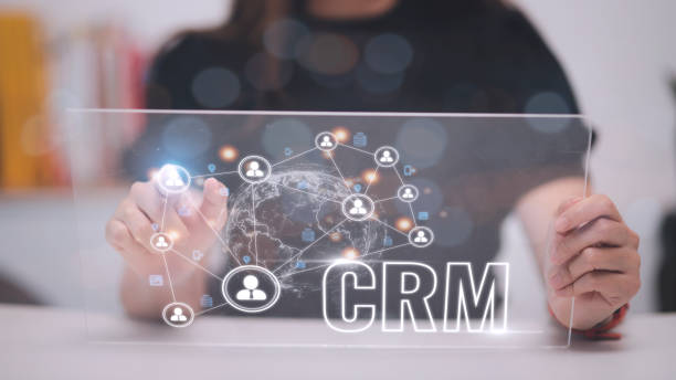 istock CRM Customer Relationship Management for business sales marketing system concept presented in futuristic graphic interface of service application to support CRM database analysis. 1448221208