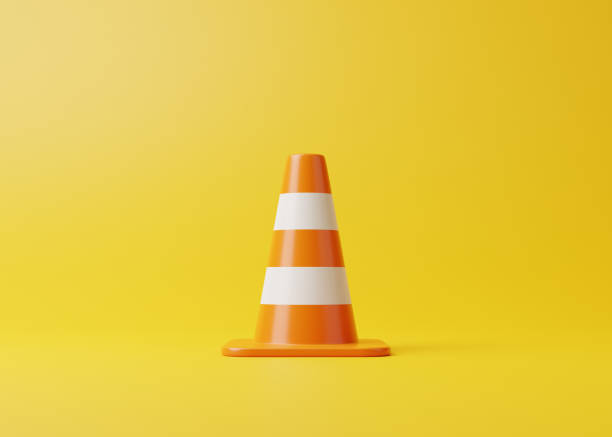 Orange traffic cone with white stripes on yellow background Orange traffic cone with white stripes on yellow background. Cartoon minimalist style. 3D rendering illustration cone shape stock pictures, royalty-free photos & images