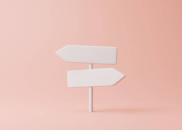 istock White direction sign on a pink background in pastel colors 1448225969
