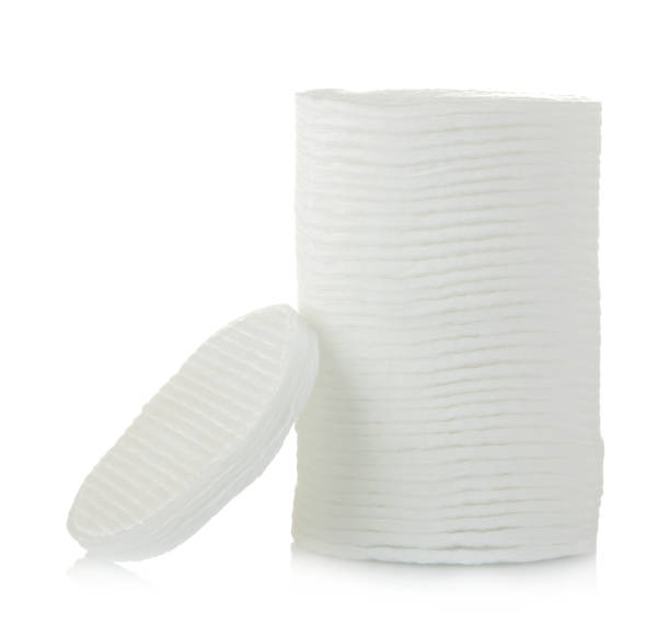 istock Cosmetic cotton pads. A stack of cotton pads on a white isolated background. spa. 1448225994
