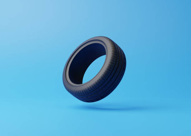 ar tire on a blue background - speed horizontal commercial land vehicle automobile industry imagens e fotografias de stock