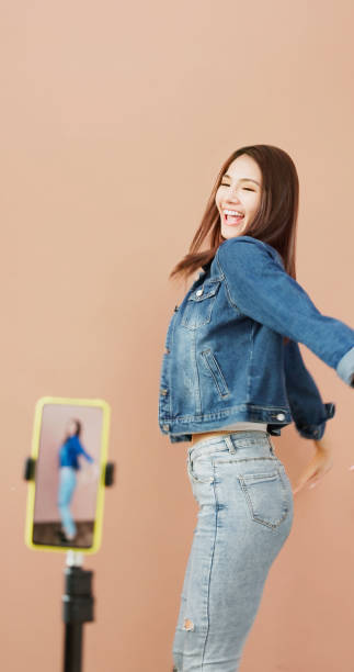 istock happy woman dance 1448228277