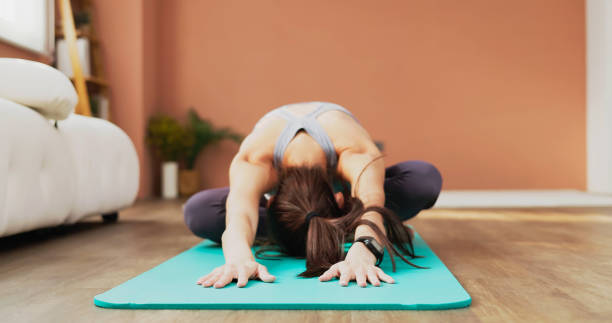 istock woman doing yoga 1448229360
