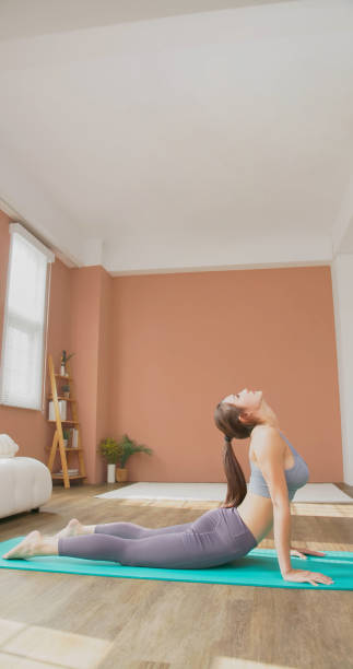 istock woman doing yoga 1448229386