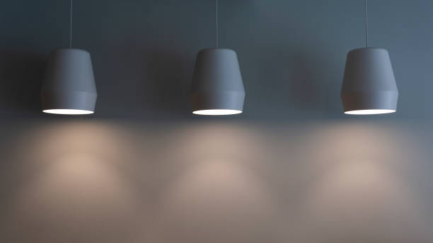 istock lamps hang on a gray wall 1448243806