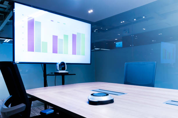 istock Television with presentation slideshow in meeting room 1448245737