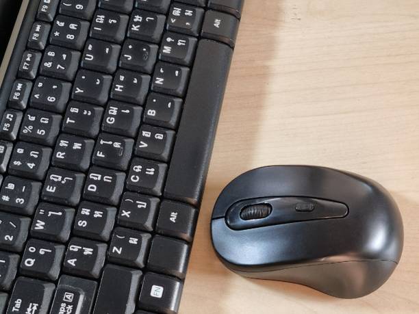 istock Computer keyboard and mouse placed on the desk in the office 1448251002