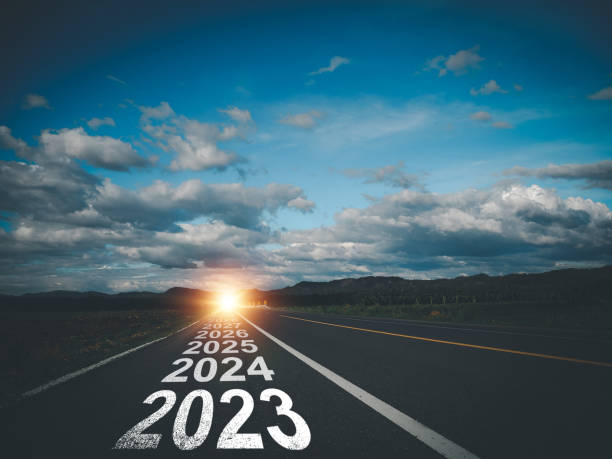 2023 letters on the road 2023 letters on the road. The beginning of the year 2023 that continues to line up the year of the future. calculating stock pictures, royalty-free photos & images