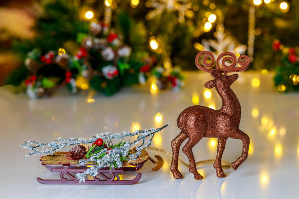 istock Raindeer toy with sled on Christmas background. 1448257755