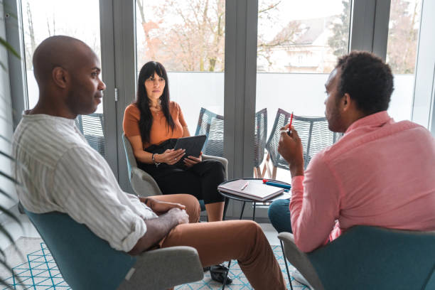 istock Multiracial People In A Meeting At A Private Clinic 1448259429