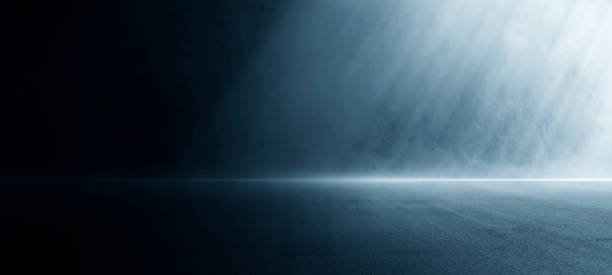 istock A dark empty street, dark blue background, an empty dark scene, neon light, spotlights The asphalt floor and studio room with smoke float up the interior texture. night view 1448261601