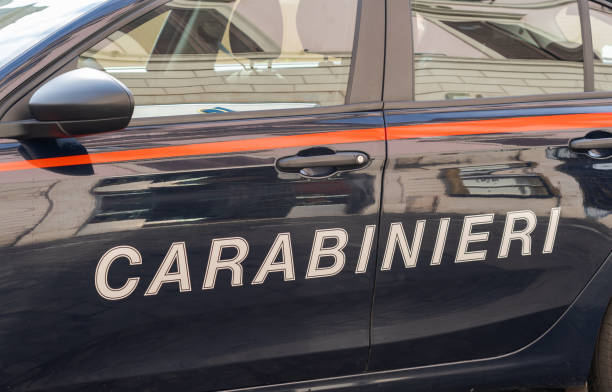 Carabinieri sign on the side of the car. Italian Carabinieri car in action in the streets of the city. Police security car stock photo
