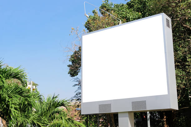 istock Billboard mockup with natural background. Template of an empty information outdoor billboard, Mock-up of a city banner placeholder and poster. 1448264313